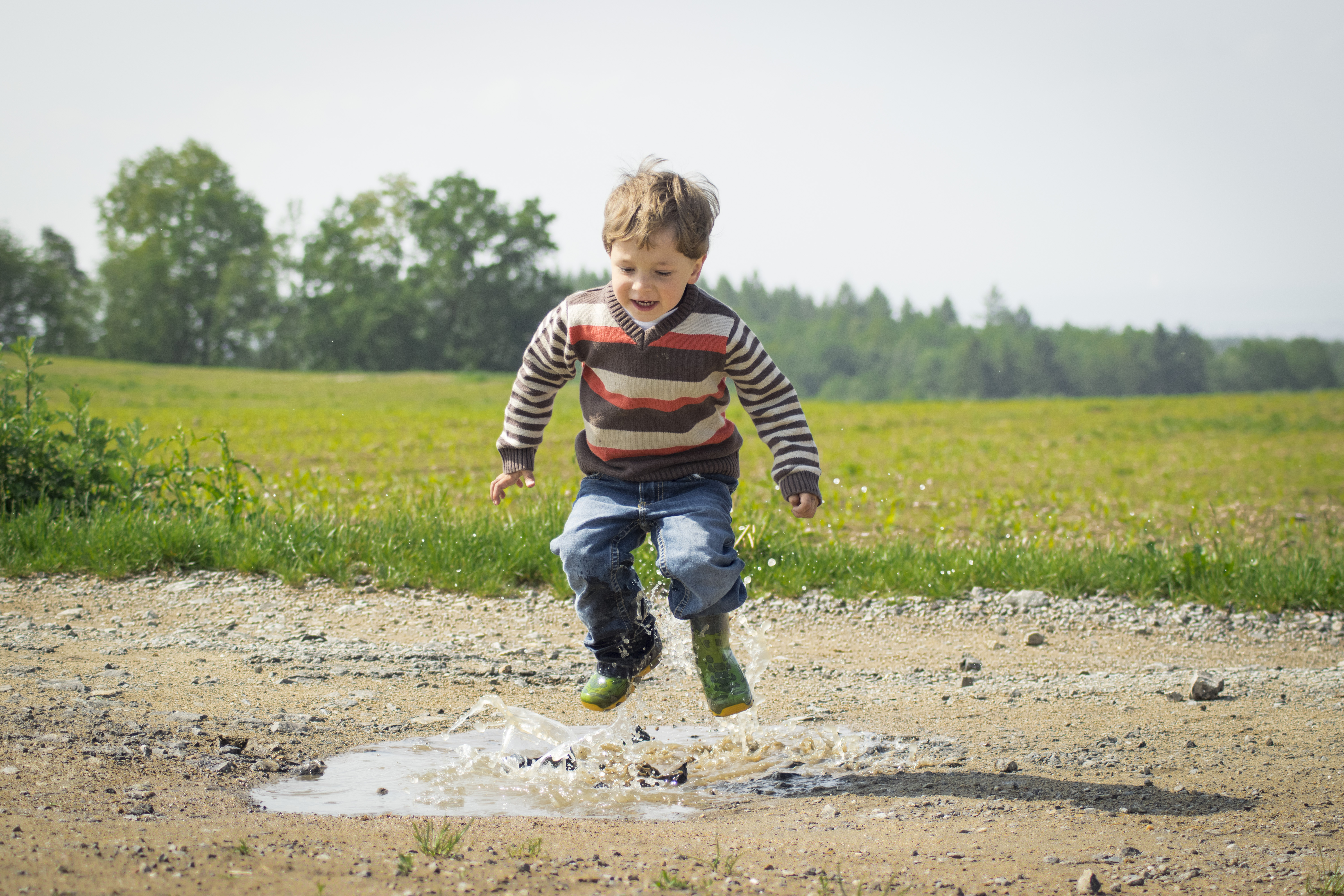 boy-jumping-near-grass-at-daytime-1104014